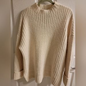 Oversized woven mock neck sweater